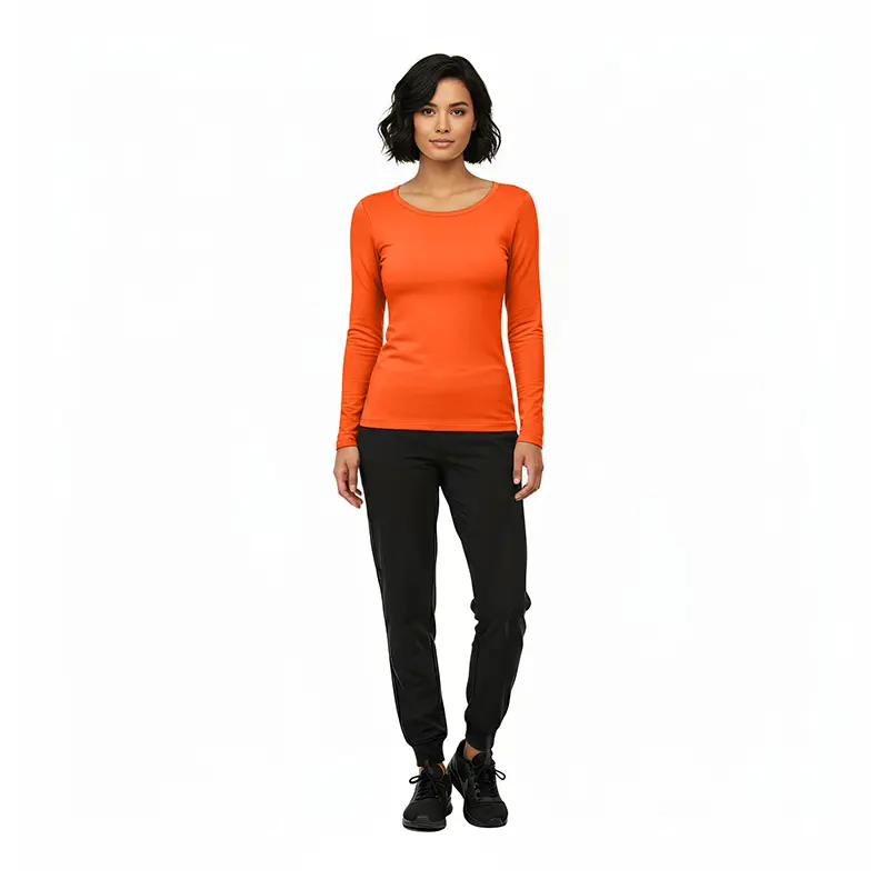 Wholesale women's orange long sleeve crew neck top with black jogger pants and black lace-up shoes