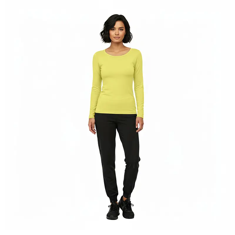 Wholesale women's yellow long-sleeve crew neck top with black jogger pants and black lace-up shoes