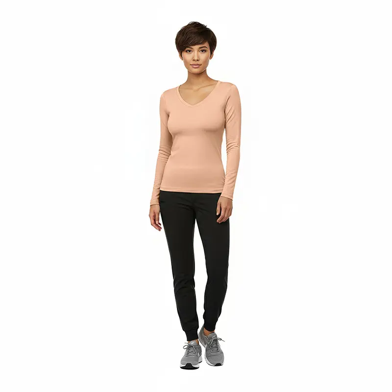 Wholesale women's peach long-sleeve v-neck top paired with black jogger pants and gray sneakers