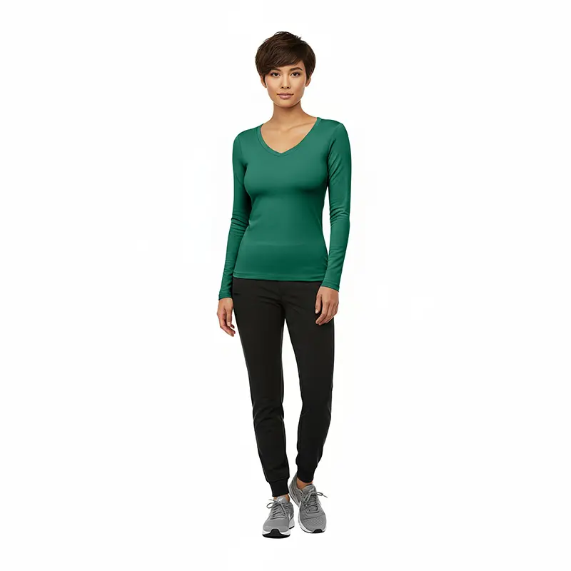 Wholesale women's green long sleeve v-neck top with black jogger pants and gray sneakers