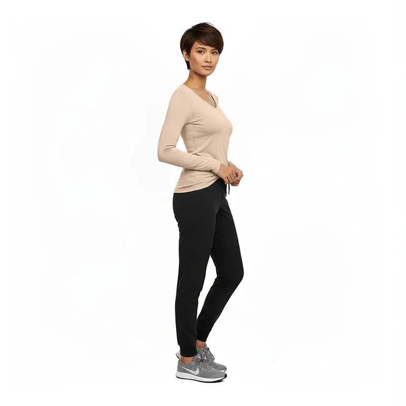 Wholesale women's long-sleeve v-neck top in beige with black leggings and gray sneakers