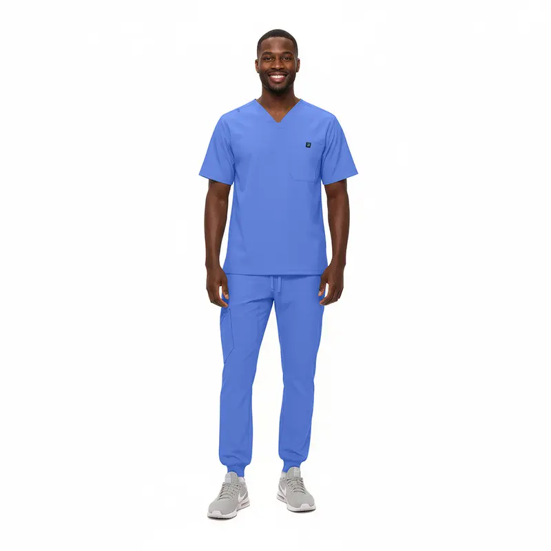 Wholesale men's blue v-neck scrub top with pocket and matching scrub pants with jogger cuffs