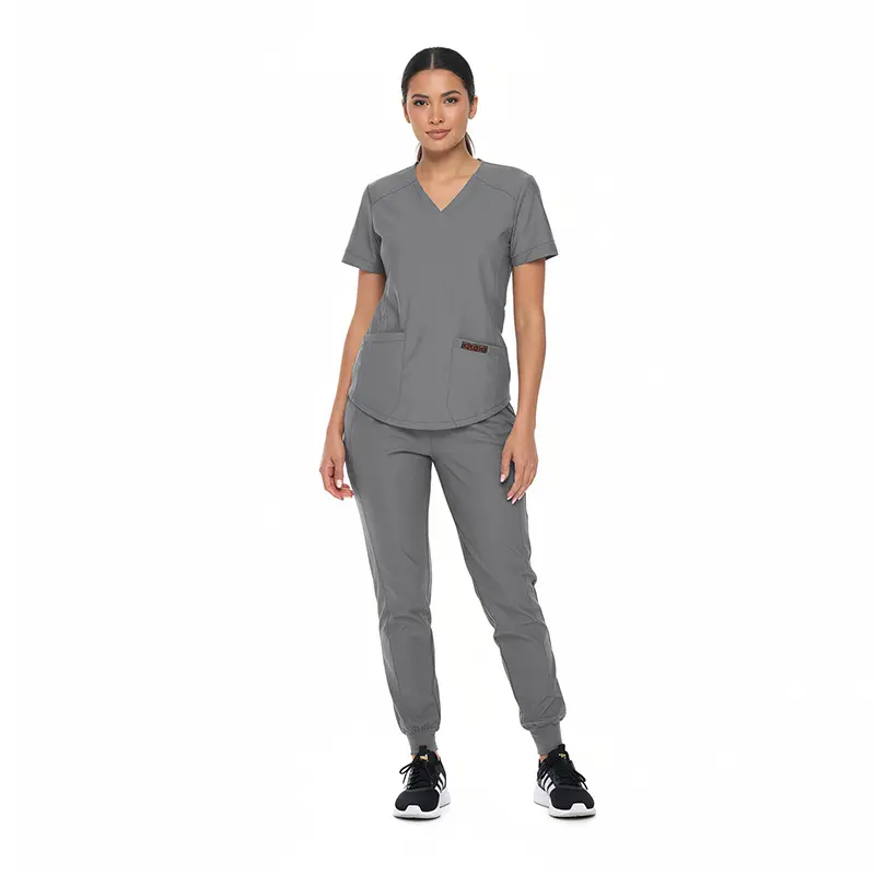 Wholesale women's gray v-neck scrub top and jogger pants set with short sleeves and front pockets