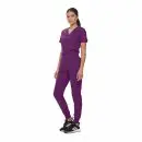 Wholesale women's purple v-neck scrub top and jogger pants set with black sneakers