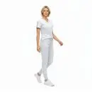 Wholesale women's white v-neck scrub top and jogger pants set with white sneakers