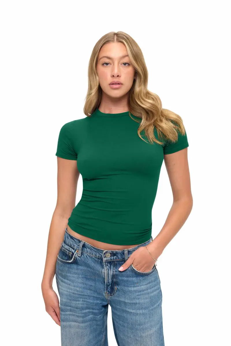 Wholesale women's forest green short-sleeve fitted crew neck t-shirt paired with blue jeans
