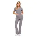 Wholesale women's gray v-neck scrub top with short sleeves and matching flare pants with pockets