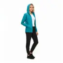 Wholesale women's teal zip-up hoodie with white undershirt, black pants, and black sneakers