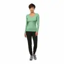 Wholesale women's long-sleeve v-neck t-shirt in sage green with black jogger pants and gray sneakers