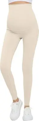 Wholesale beige maternity leggings with ruched side panel and high waistband worn with white sneakers